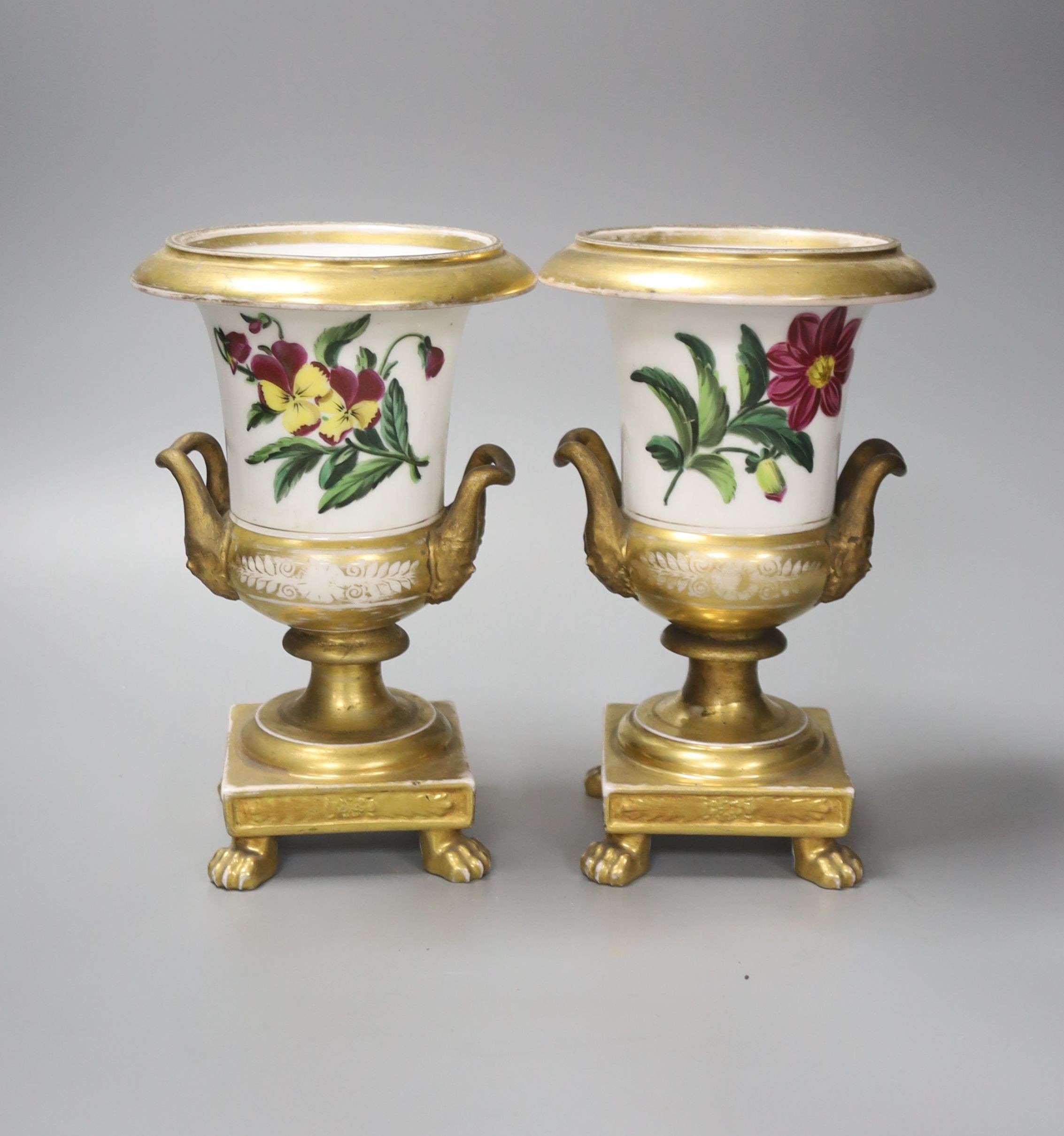 A pair of Paris porcelain flower painted campana urns, with receipt from 1928 £3.10, 20cm